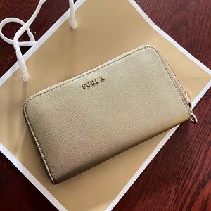 Like new Furla leather zip around long wallet